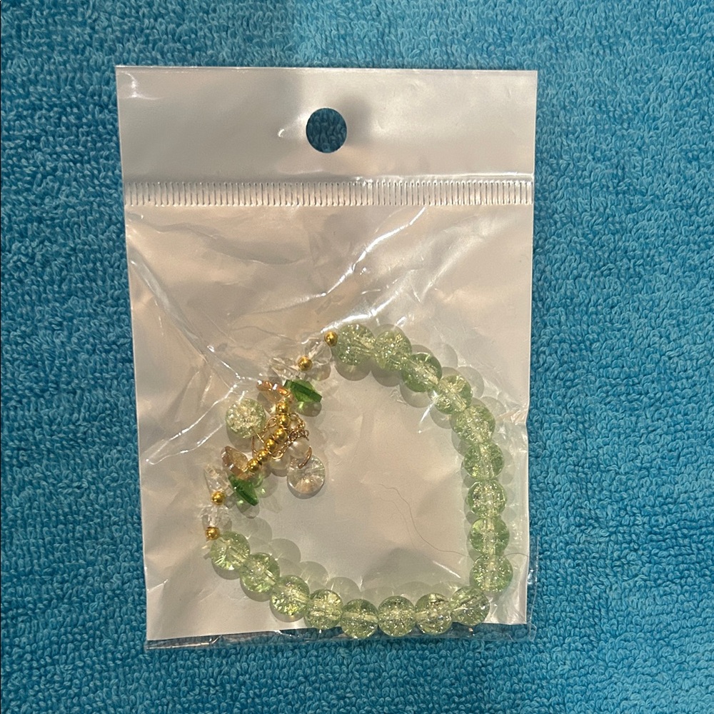 Green Beaded Bracelet with Gold Accents